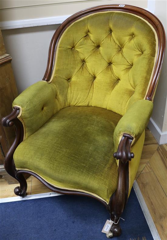 A Victorian carved mahogany armchair